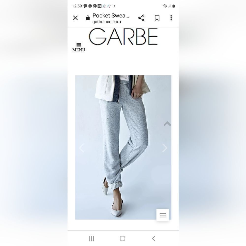 Garbe luxe Raw edge details, front pockets, cuffed hem. 100% supima cotton